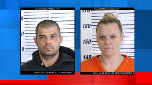 Man, woman facing charges after being pulled from home in Davenport