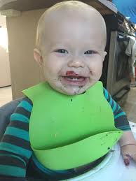 9 month old baby holding food in mouth?