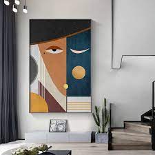 To bring color into the living room, hang a painting above the sofa. Modern Abstract Faces Geometric Canvas Painting Contemporary Wall Art Pictures Posters And Prints Living Room Home Decoration Nordic Wall Decor