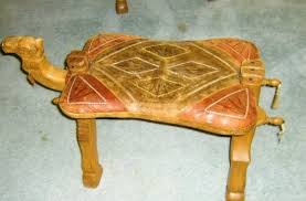 How do you ride an animal with a hump in the middle of its back? Joe Rosson Current Market Is Bumpy For Camel Seat Stools