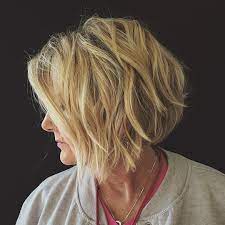 Wispy tendrils frame the face, and the subtle gray highlights over black hair are all the rage. 50 Best Hairstyles For Women Over 50 For 2021 Hair Adviser