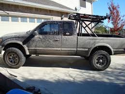 1 tubing tire hoist is off the truck from under the bed. For Sale Tacoma Custom Bed Safari Rack W Hilift Lights Accessories Ih8mud Forum