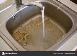 stainless steel sink plug hole close up