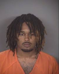 Man accused of killing woman after firing shots through apartment wall  charged with murder