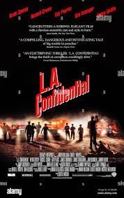 L.A. Confidential (1997) directed by Curtis Hanson and starring Kevin  Spacey, Russell Crowe, Guy Pearce, Kim Basinger and Danny DeVito.  Adaptation of James Ellroy's novel set in the 1950s about the police