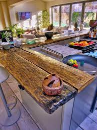 Kitchen countertops with beautiful textures that will stun your eyes! 44 Reclaimed Wood Rustic Countertop Ideas Wood Countertops Rustic Kitchen Outdoor Kitchen Countertops