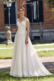 Style 44144 A Line Dress With Illusion Sabrina Neckline And Beaded Appliques Sincerity Bridal Sincerity Bridal Wedding Dresses Bridal Wedding Dresses Sincerity Bridal