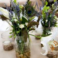 The Knot Blog Wedding Dresses Shoes Hairstyle News Ideas Peacock Centerpieces Feather Centerpiece Wedding Peacock Wedding Theme