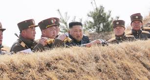 North korea plans to boost its military capacities in defiance of the announcement came just a day after north korean television broadcast an unprecedented portrait of leader kim jong un in military uniform. Kim Jong Un Oversees Artillery Strike Contest By North Korean Army Kcna Nk News