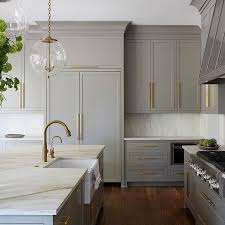 Let's take a look at cabinet door designs and how they can help give you an idea of the best backsplash for white cabinets to choose! White Glass Cabinet Doors And Gold Kitchen Cabinet Hardware Modern Kitchen Cabinet Design New Kitchen Cabinets Modern Kitchen Cabinets