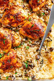 Easy Oven Baked Chicken And Rice With Garlic Butter Mushrooms Mixed Through Is Winner Of A Chicken Easy Chicken And Rice Baked Chicken Easy Oven Baked Chicken