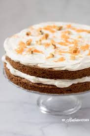 Sweet And Dense Cake Filled With Carrots Spices And Nuts And Topped With A Creamy Cinnamon Cr Low Carb Carrot Cake Carrot Cake Gluten Free Carrot Cake Recipe