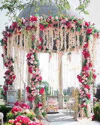 Wedding Mandap Decoration With Flowers In Shades Of Pink And White Using An Existing Dome Structur Wedding Venue Decorations Wedding Decorations Mandap Decor