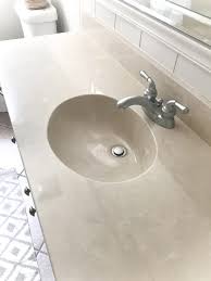 The past owners made that part easy by not caulking the vanity top! Diy Painted Bathroom Sink Countertop Bless Er House