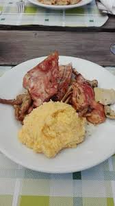 poˈlɛnta) is a dish of boiled cornmeal that was historically made from other grains. Coniglio Arrosto Con Polenta Picture Of La Baita Zambla Alta Tripadvisor