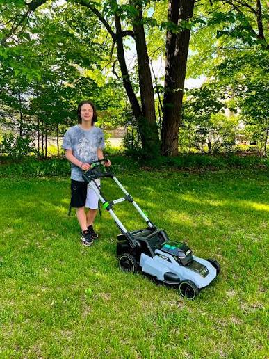 Gardener reviving a front lawn in Belvedere DA17 during spring