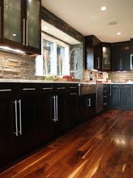 Stone Backsplash Black Cabinets Hardwood White Counter Top Exactly What I Picture For The New York Home Stone Backsplash Kitchen Marble Kitchen Design