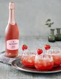 Add a spoonful of pureed strawberries to a shot glass. 9 Insanely Refreshing Rose Cocktail Recipes Brit Co