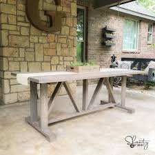 Make storage diy outdoor table out of clay and wooden top. Diy 60 Outdoor Dining Table Shanty 2 Chic