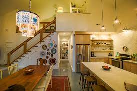 A bright kitchen with a geometric yellow and white floor, navy cabinets and dark stained wooden beams on the ceiling. 75 Beautiful Yellow Kitchen With Light Wood Cabinets Pictures Ideas June 2021 Houzz