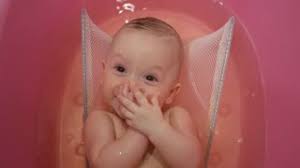 Dont bathe your baby in a baby tub or bath until the umbilical cord falls off. Mother Washing Her Little Baby Boy In A Bath At Home Stock Video Footage Storyblocks
