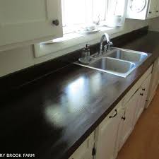 Solid wood counters have been around since the beginning of time, and for good reason, as this natural material has proven to be durable, resilient and timeless. This Website Is Currently Unavailable Painting Kitchen Countertops Laminate Countertops Diy Countertops