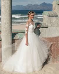 Solche sehen wir in den kollektionen von valentino rosa im kontext der aktuellen hochzeitstrends. Moderne Brautkleider Fur Ihre Strandhochzeit Nach Den Trends 2017