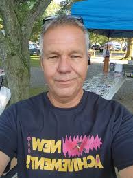 Representing DCC at the flea market DUNGEON CRAWLER CARL 老洋 απ DINNIMAN त  ពូ ТИЗмЕиноА