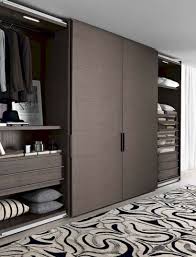 In sliding wardrobes, the doors slide in one section when opened and the only area covered is of the wardrobe itself. Modern Bedroom Modern Sliding Wardrobe Design Trendecors
