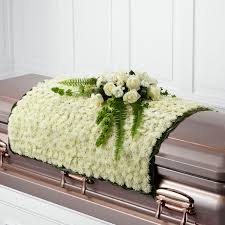 ~ on the perfection style casket the ogee is attached to the crown and part of the cap of the casket. Sofia Florist Funeral Casket Spray Flowers Delivery Sofia
