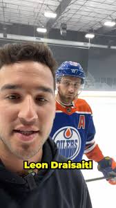 Tate McRae brought out a custom Zamboni at her album release party, and  there was an NHL All-Star logo