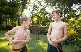 Fondato il 14 marzo 1898, ha come colori sociali il giallo e il nero. Two Young Boys Fighting Over A Hose Stock Photo Offset