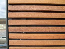 Sichtschutz Fmh Metallbau Und Holzbau Stuttgart Fellbach Schiebeladen Holzbau Fassadenverkleidung Holzoptik