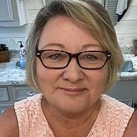 Hiding in Plain Sight by Laura Scott