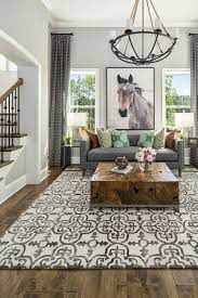 Equestrian Rustic Sitting Room With Patterned Carpet This Bel Aire Model At Mas Bohemian Living Room Decor Small House Living Room Modern Bohemian Living Room
