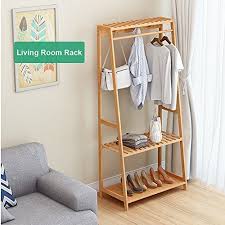 Crafted from manufactured wood, it features a streamlined design that lets you corral clothes in understated say goodbye to the cold rigid garment and flimsy wooden shelves. Ufine Garment Rack Bamboo Wood Entryway Coat Rack 3 Tiers Shoe Clothes Storage Shelves 6 Coat Hooks 1 Hanging Bar For Bag Clothing Umbrella Holder Living Room B Wooden Clothes Rack