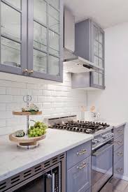 Grey Ikea Cabinetry Paired With White Subway Makes For A Perfect Small Kitchen Space In 2020 Glass Kitchen Cabinet Doors Kitchen Design Small Glass Kitchen Cabinets