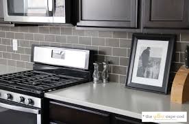Over the past year, i've been working with scott and beth in many different rooms of their brand new home. The Yellow Cape Cod Dark Tile Light Grout Kitchen Backsplash Dark Tile Gray Kitchen Backsplash Kitchen Design