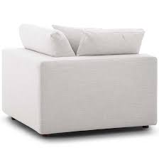 Corner chair with a light gray slipcover offers a cozy reading area bringing extra comfort with a matching ottoman next to a round iron accent table. Commix Down Filled Overstuffed Corner Chair Contemporary Modern Furniture Modway