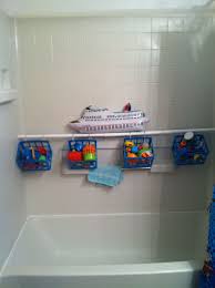 Dollar Store Baskets Shower Curtain Rod And Rings Out Of The Way Bath Toy Storage Bath Toy Storage Shower Curtain Rods Store Basket