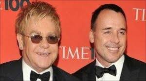 Here we take a look behind the scenes at his life with husband david furnish and their children zachary and elijah. Sir Elton John Becomes Father Via Surrogate Bbc News
