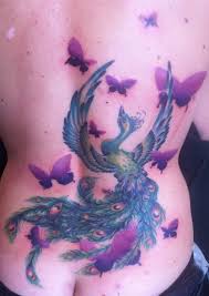 Simple, sweet, and looks great on the scapula. Blue Phoenix Tattoo With Purple Butterflies