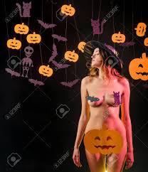 The Most Popular Candy For Halloween. Nude Woman Witch With Halloween Hat  And Pumpkin. Womens Clothing Store Celebrates Halloween. Stock Photo,  Picture and Royalty Free Image. Image 109831016.