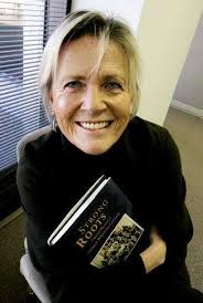 Faculty member traces college's strong roots