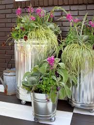 12 Unusual And Upcycled Container Gardens Home Improvement Diy Network Garden Containers Container Gardening Metal Trash Cans