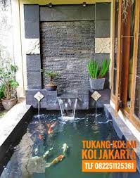 Suasana alam ini akan menciptakan ketenangan dan kesejukan dalam rumah. Desain Kolam Ikan Koi Radea