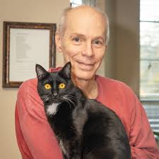 Ralph snapped this photo. Bustopher is better at looking at the camera.  FYI, that thing