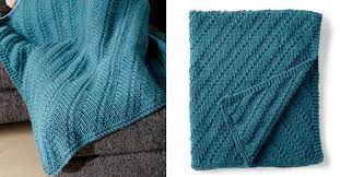 You won't be able to resist cuddling in this thing. Reversible Knitted Lap Blanket Free Knitting Pattern