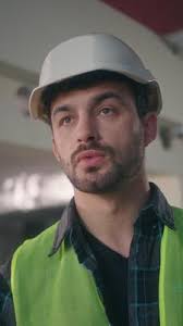 Caucasian man architect contractor guy male executive technician talking  walkie talkie connect builder communicate radio set in construction foreman  control work employee building process manufactory