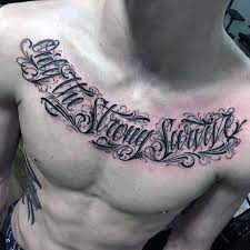 Top 41 Chest Writing Tattoo Ideas 2020 Inspiration Guide Chest Tattoo Men Tattoos Writing Tattoo